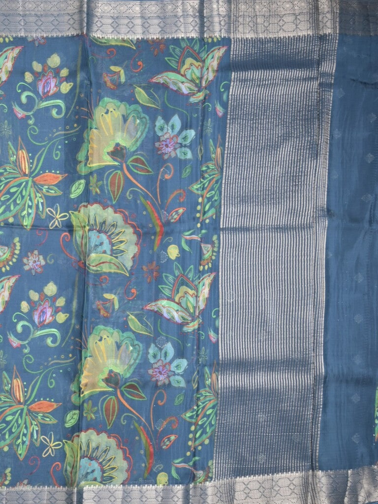 Georgette fancy saree peacock blue color allover prints & zari border with zari pallu and plain blouse