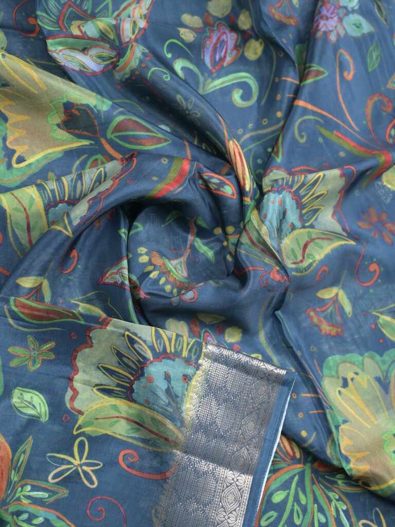 Georgette fancy saree peacock blue color allover prints & zari border with zari pallu and plain blouse