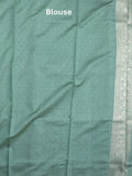 Dupion fancy saree lux green color allover zari motifs & zari border with rich pallu and plain blouse