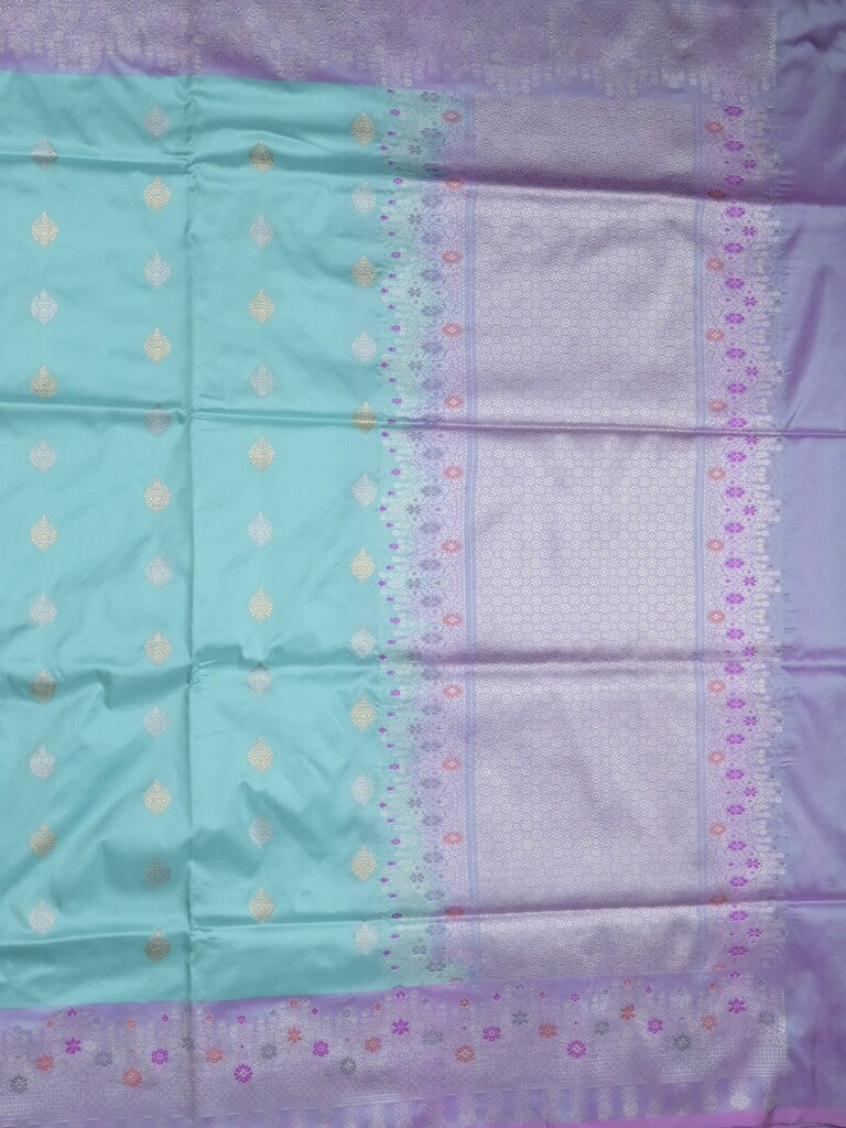 Banaras pattu saree sky blue color allover zari motifs & zari border with rich pallu and contrast plain blouse