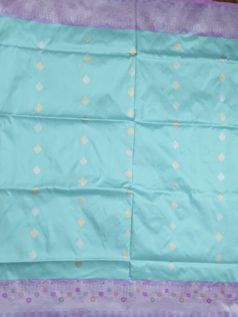 Banaras pattu saree sky blue color allover zari motifs & zari border with rich pallu and contrast plain blouse