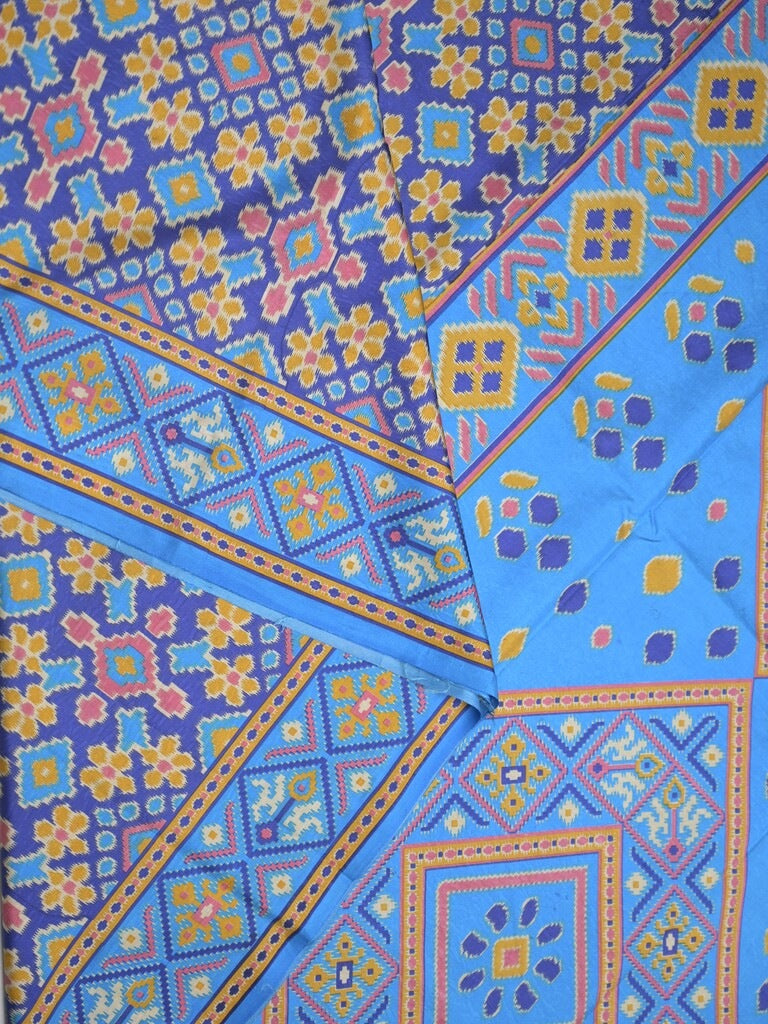Crape fancy saree blue color allover prints & contrast border with printed pallu and attached plain blouse