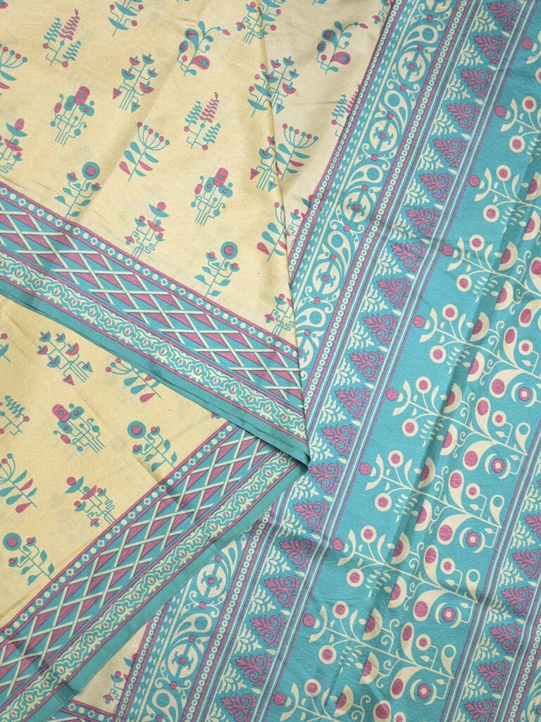 Crape fancy saree light cream color allover prints & contrast border with printed pallu and attached plain blouse