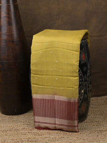Maheshwari fancy saree light yellow color allover zari motifs & zari border with contrast pallu and attached blouse