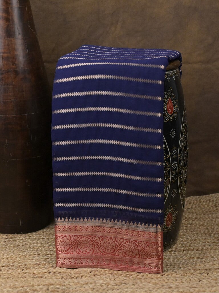 Georgette fancy saree navy blue color allover zari stripes & zari border with rich pallu and plain blouse
