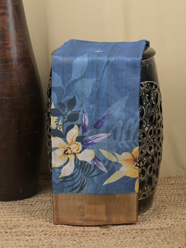 Tussar fancy saree blue color allover prints & small kaddi border with printed pallu and attached contrast plain blouse