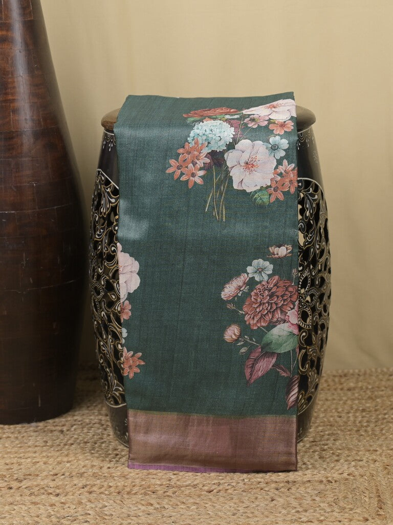 Tussar fancy saree dark green color allover prints & small kaddi border with printed pallu and attached contrast plain blouse
