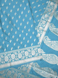 Banaras pattu saree in sky blue color allover zari motifs & zari border with brocade pallu and brocade blouse