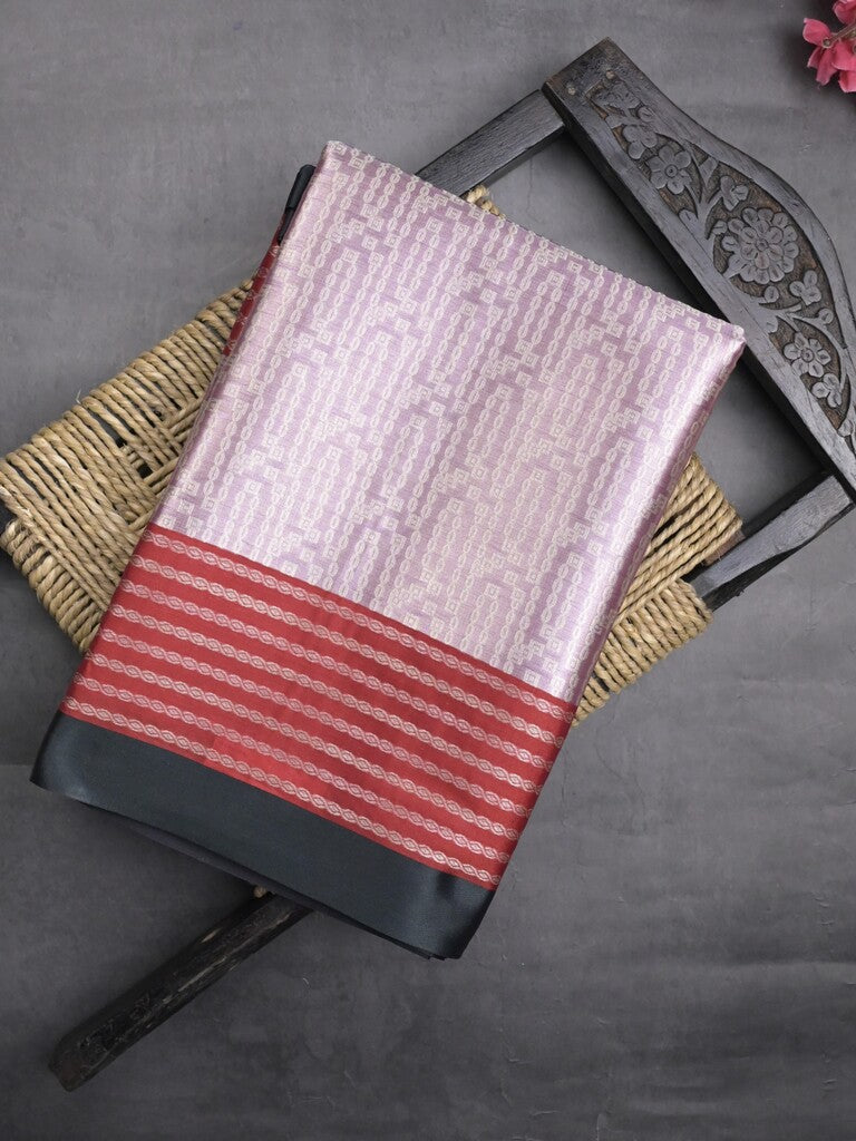 Tissue fancy saree light purple color allover weaves & contrast border with self pallu and attached blouse
