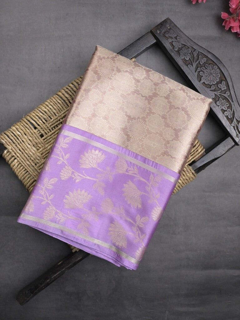 Tissue fancy saree light beige color allover weaves & contrast border with self pallu and attached blouse