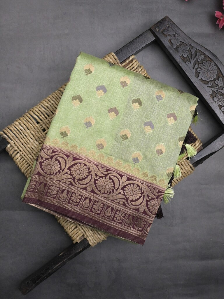 Banaras fancy saree light pista green color allover zari motifs & zari border with rich pallu and attached blouse