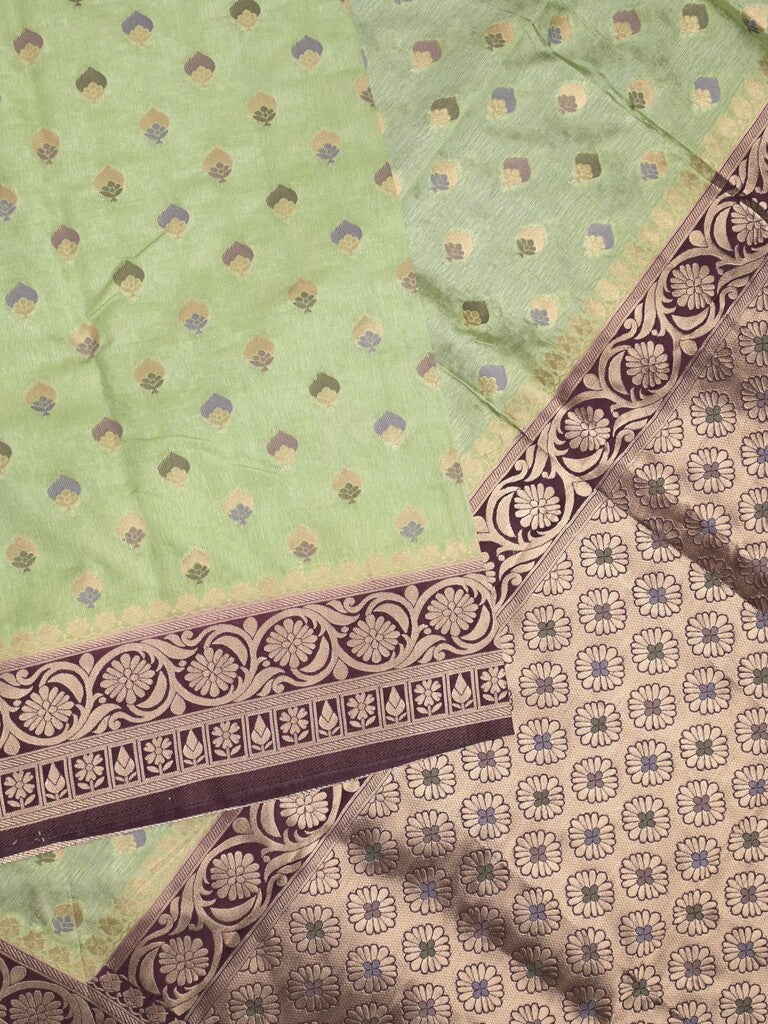 Banaras fancy saree light pista green color allover zari motifs & zari border with rich pallu and attached blouse