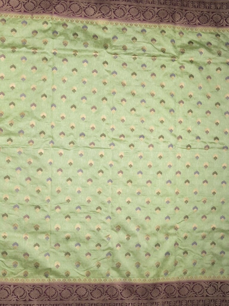 Banaras fancy saree light pista green color allover zari motifs & zari border with rich pallu and attached blouse