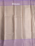Tissue fancy saree light beige color allover weaves & contrast border with self pallu and attached blouse