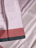 Tissue fancy saree light purple color allover weaves & contrast border with self pallu and attached blouse