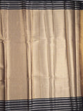 Tissue fancy saree cream color allover weaves & contrast border with self pallu and attached blouse