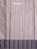 Tissue fancy saree light purple color allover weaves & contrast border with self pallu and attached blouse