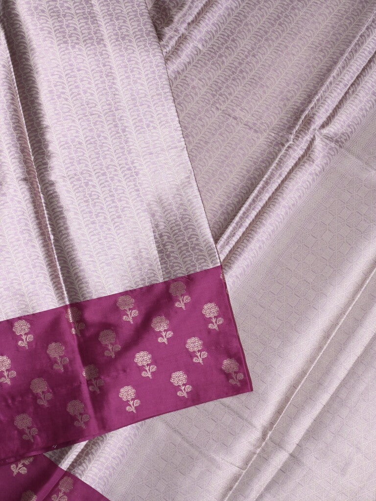 Tissue fancy saree pastel purple color allover weaves & contrast border with self pallu and attached blouse