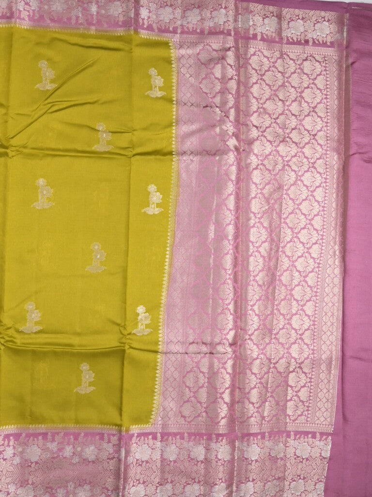 Raw mango fancy saree greenish yellow color allover zari motifs & zari border with zari pallu and contrast blouse
