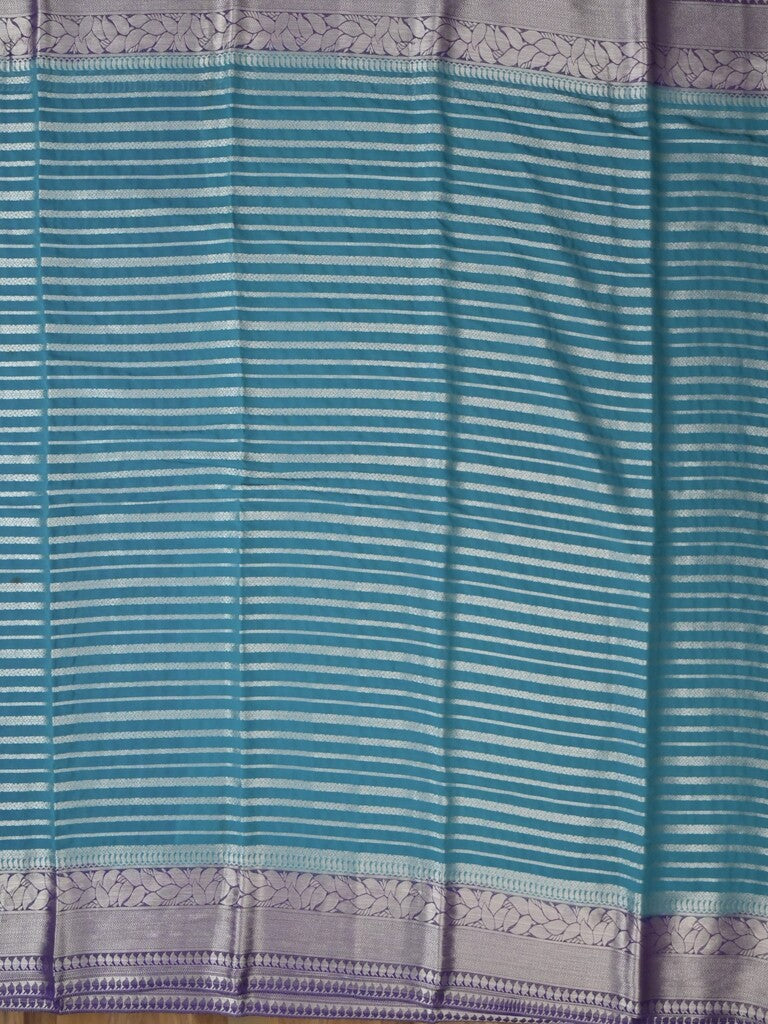 Georgette fancy saree sky blue color allover zari stripes & zari border with rich pallu and plain blouse