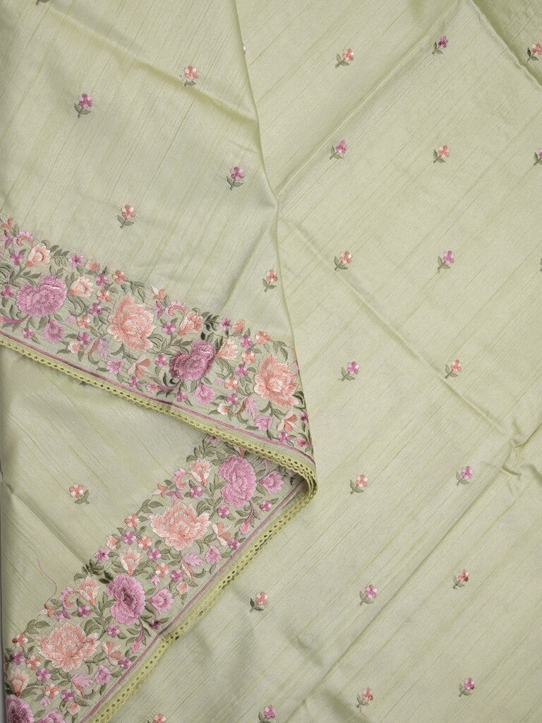 Tussar fancy saree light pista green color allover embroidery motifs & embroidery border with running pallu and printed blouse