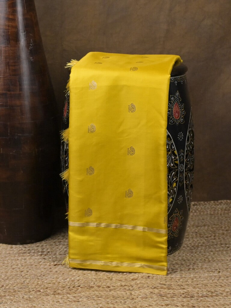 Satin silk fancy saree bright yellow color allover zari motifs & zari border with rich pallu and contrast blouse