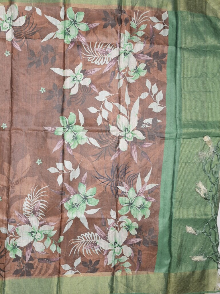 Tussar fancy saree brown color allover prints & small kaddi border with printed pallu and attached contrast plain blouse