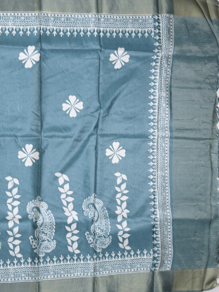 Tussar fancy saree peacock blue color allover prints & small kaddi border with printed pallu and attached plain blouse