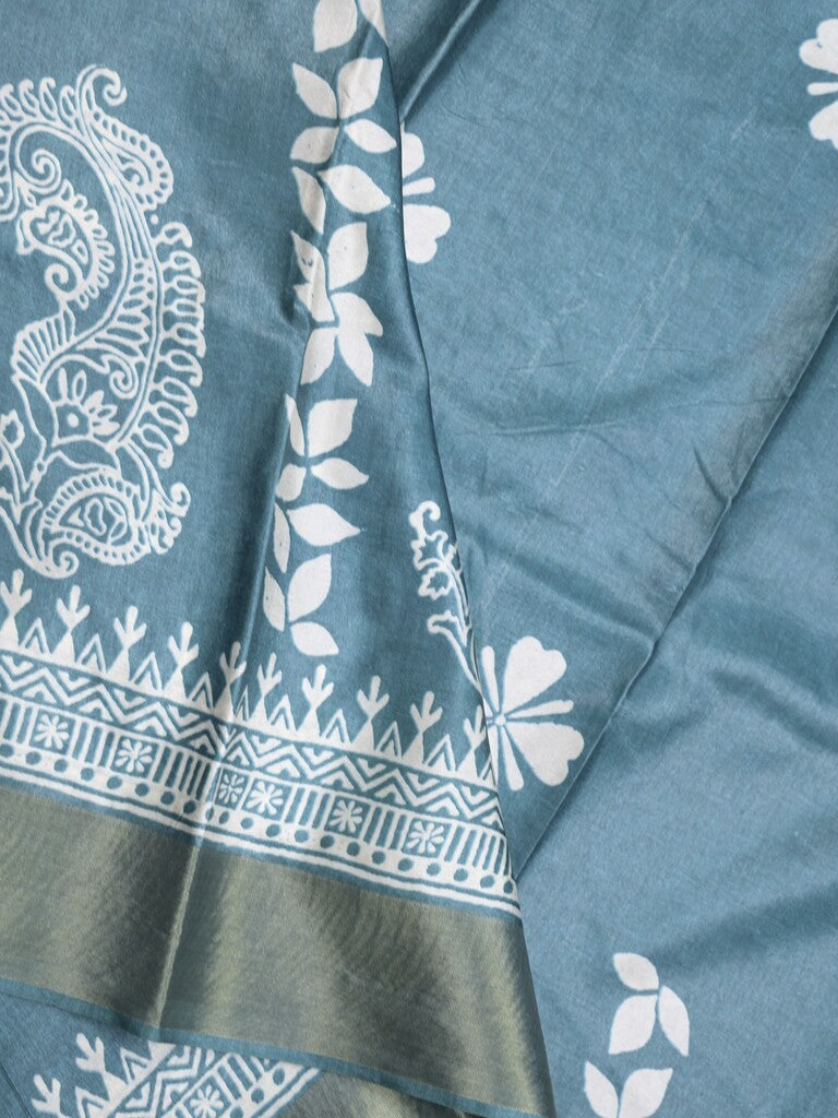 Tussar fancy saree peacock blue color allover prints & small kaddi border with printed pallu and attached plain blouse