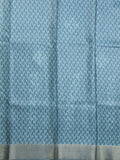 Tussar fancy saree peacock blue color allover prints & small kaddi border with printed pallu and attached plain blouse