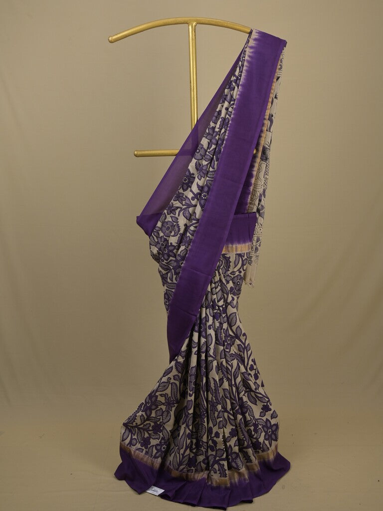 Kalamkari silk saree in cream, featuring a contrast color border and plain matching blouse