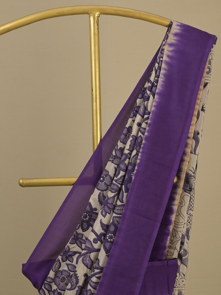 Kalamkari silk saree in cream, featuring a contrast color border and plain matching blouse