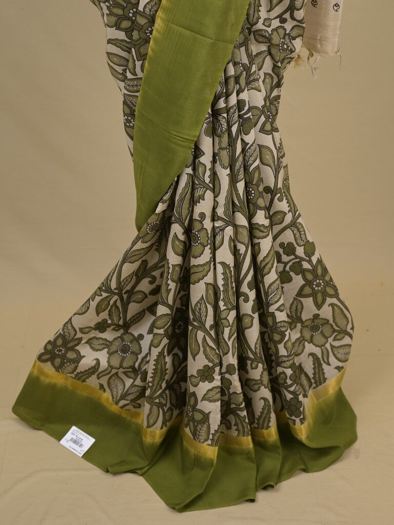 Kalamkari silk saree in cream, featuring a contrast color border and plain matching blouse