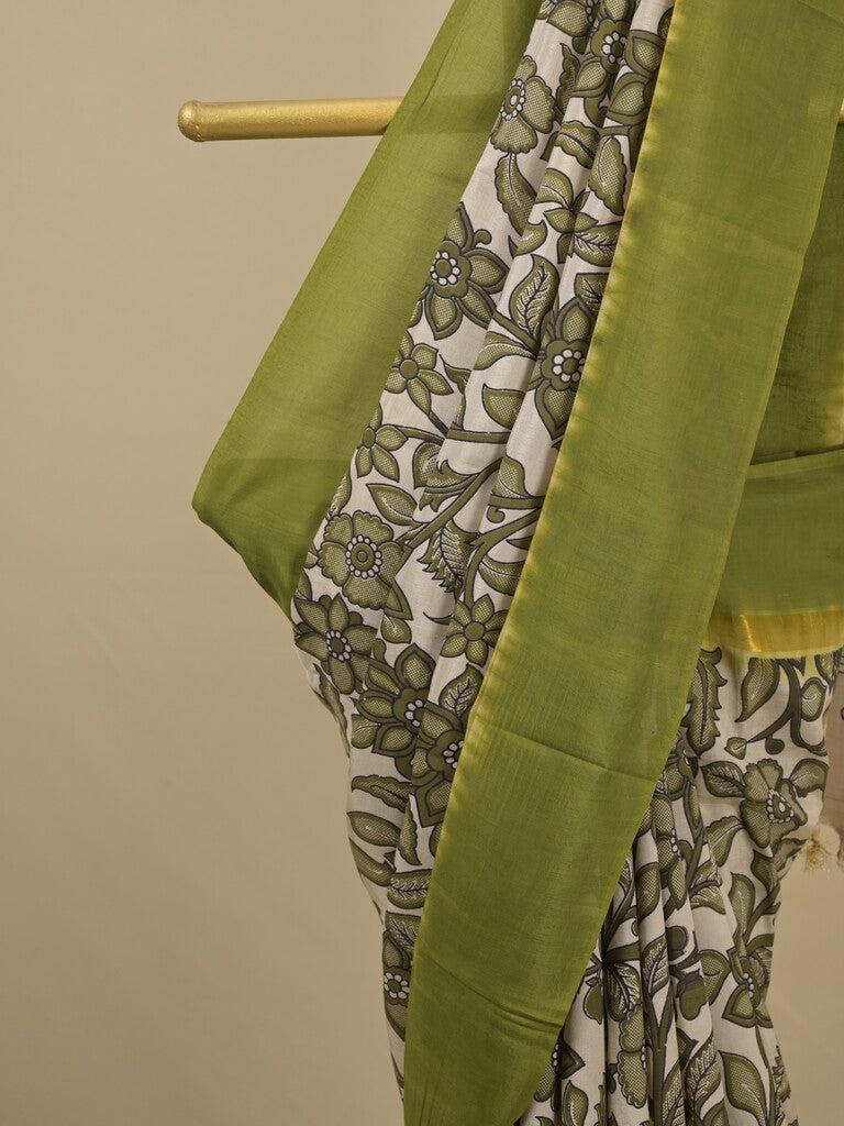 Kalamkari silk saree in cream, featuring a contrast color border and plain matching blouse