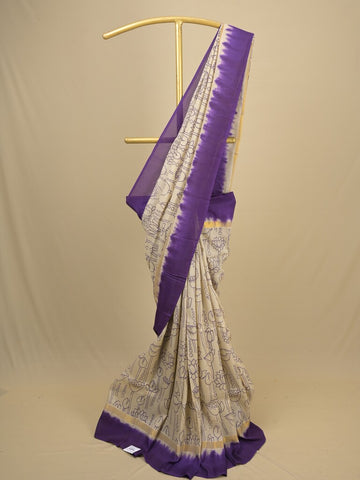 Kalamkari silk saree in cream, featuring a contrast color border and plain matching blouse
