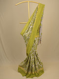 Kalamkari silk saree in cream, featuring a contrast color border and plain matching blouse