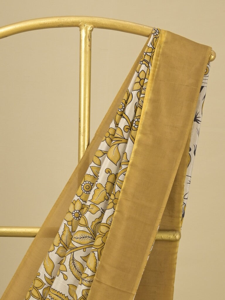 Kalamkari silk saree in cream, featuring a contrast color border and plain matching blouse