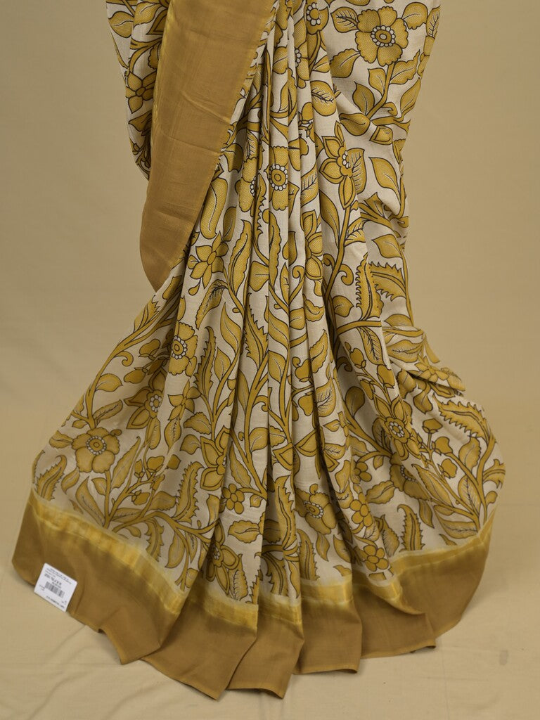 Kalamkari silk saree in cream, featuring a contrast color border and plain matching blouse