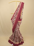 Kalamkari silk saree in cream, featuring a contrast color border and plain matching blouse