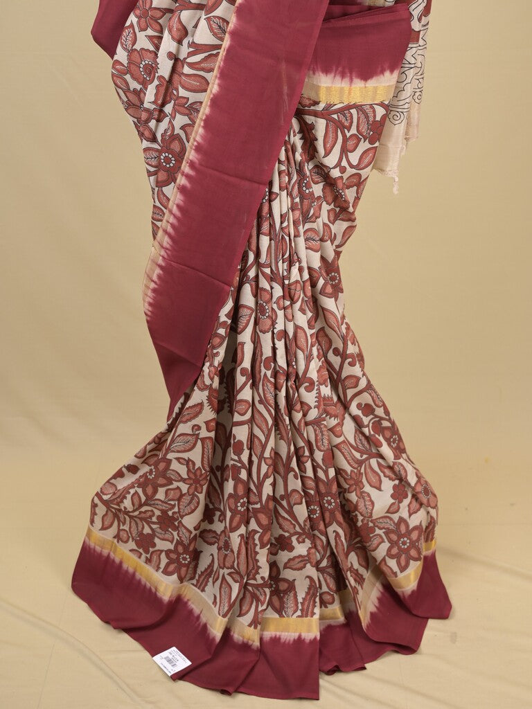 Kalamkari silk saree in cream, featuring a contrast color border and plain matching blouse
