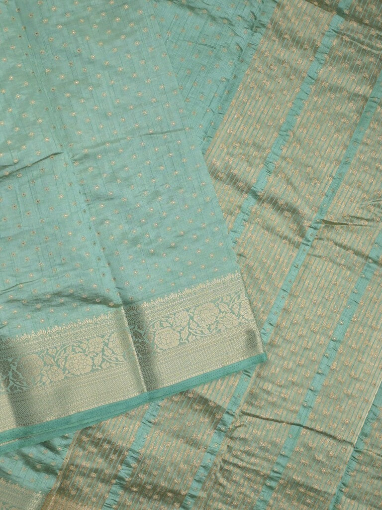 Dupion fancy saree light blue color allover zari motifs & zari border with stripes pallu and running blouse