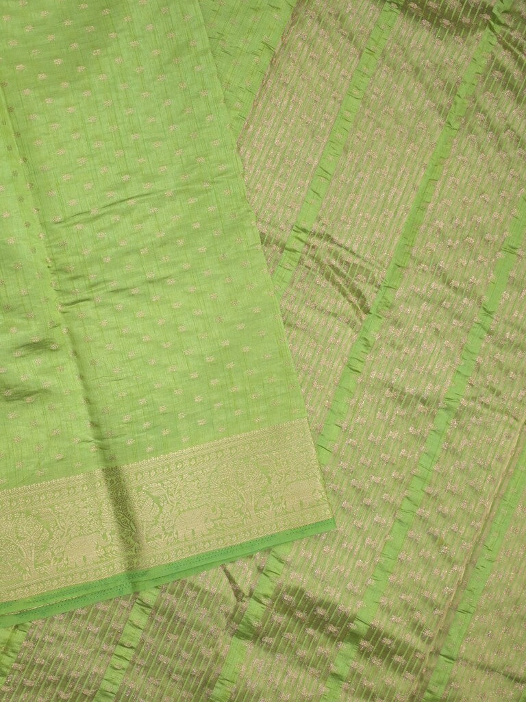 Dupion fancy saree parrot green color allover zari motifs & zari border with stripes pallu and running blouse