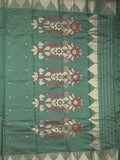 Dupion fancy saree dark green color allover zari motifs & zari border with zari pallu and running blouse