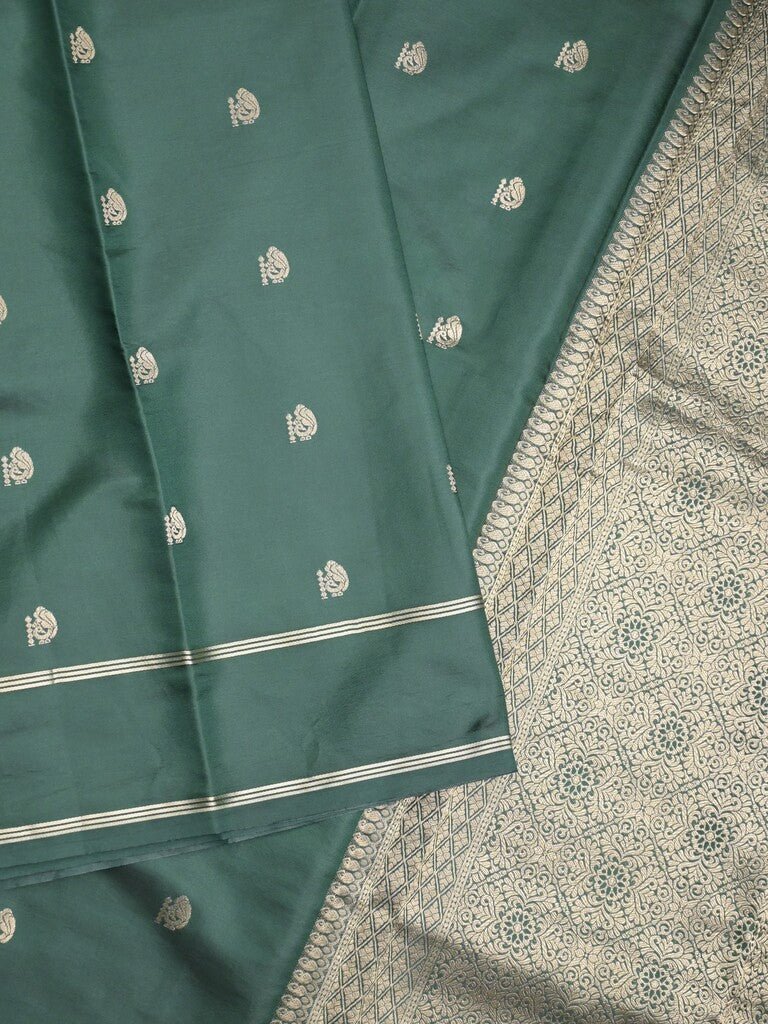 Satin silk fancy saree dark green color allover zari motifs & zari border with rich pallu and contrast blouse