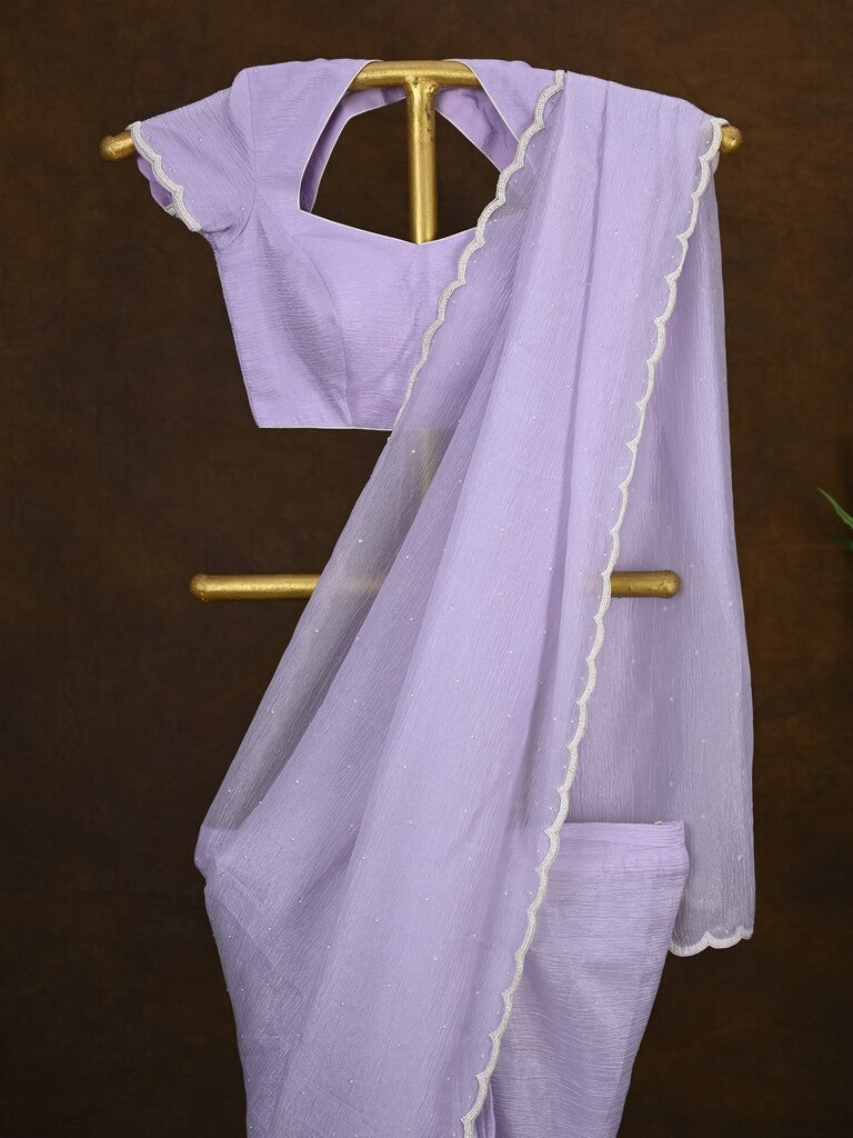 Crush organza fancy saree lavender color allover embroidery motifs & embroidery border with running pallu and stitched blouse