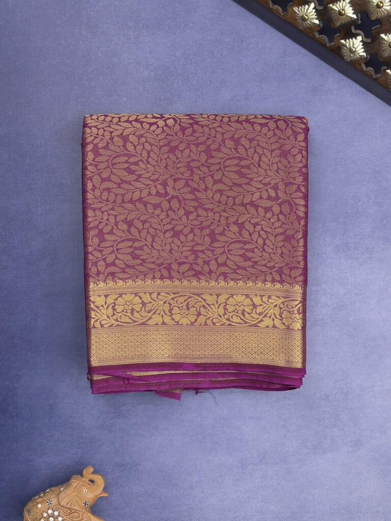 Georgette fancy Saree in purple color allover weaves, Zari Border with rich pallu and plain blouse