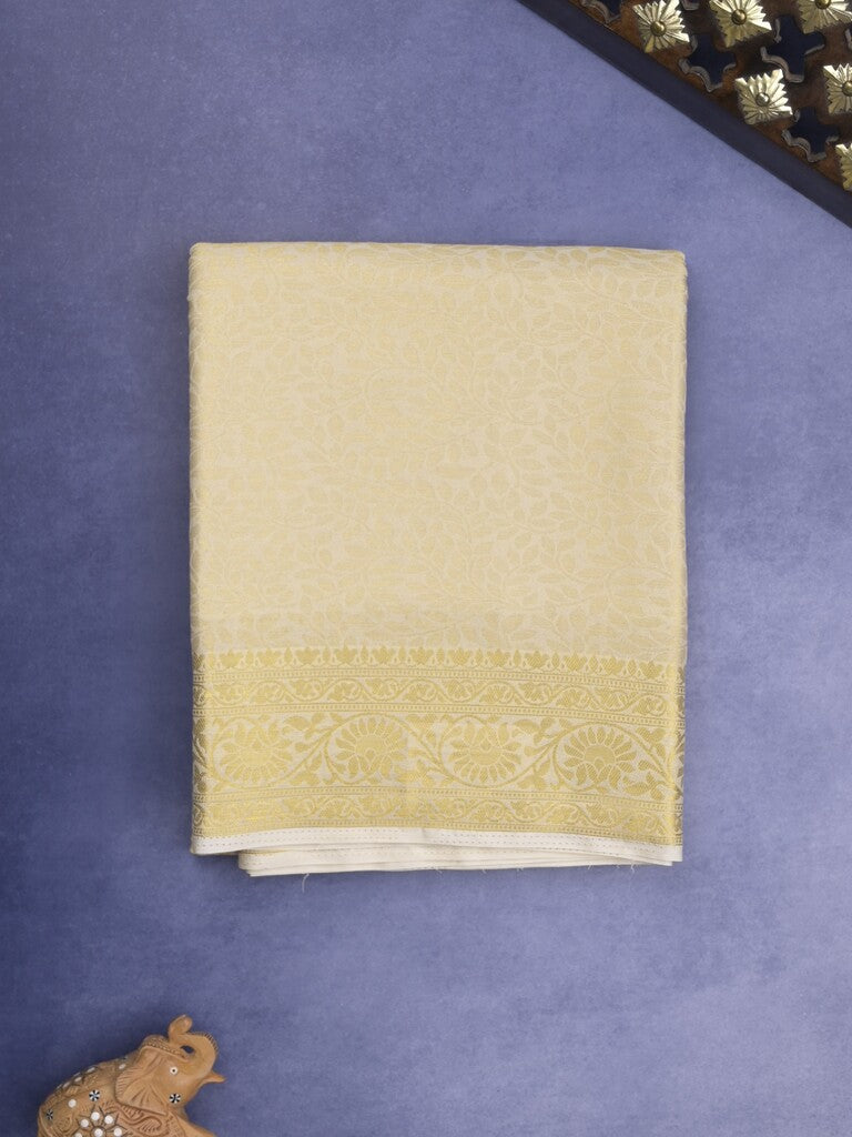 Georgette fancy Saree in cream color allover weaves, Zari Border with rich pallu and plain blouse