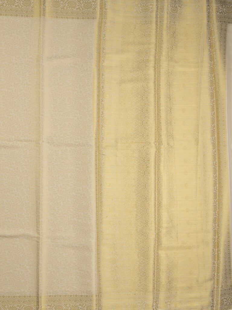 Georgette fancy Saree in cream color allover weaves, Zari Border with rich pallu and plain blouse