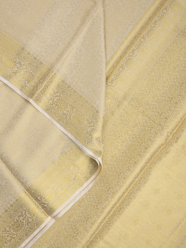 Georgette fancy Saree in cream color allover weaves, Zari Border with rich pallu and plain blouse