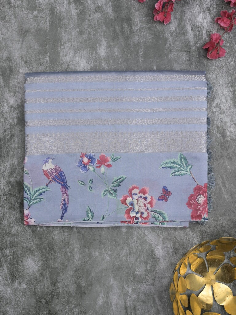 Dupion fancy saree light blue color allover stripes & printed border with printed pallu and printed blouse